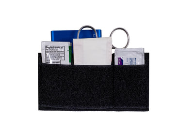 EDC velcro pocket - front, loaded with small first aid supplies and other small items