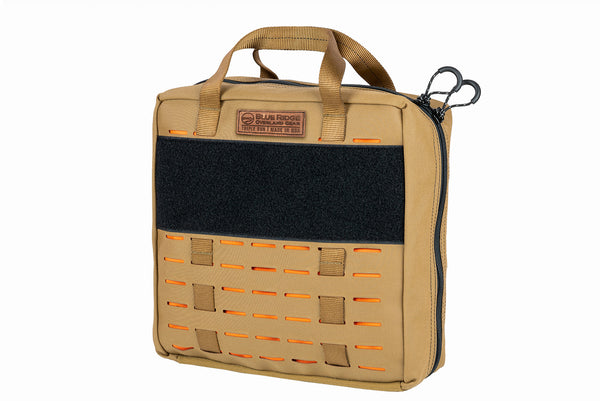 Front angled view of BROG Tool Bag in Coyote with orange accents, hook-and-loop panel, and laser-cut MOLLE.