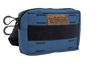 Bum Bag XL in Ocean Blue - front angled, with leather BROG tag and velcro 