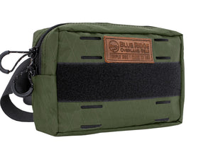 Bum Bag XL in Olive Green - front angled, with leather BROG tag and velcro 