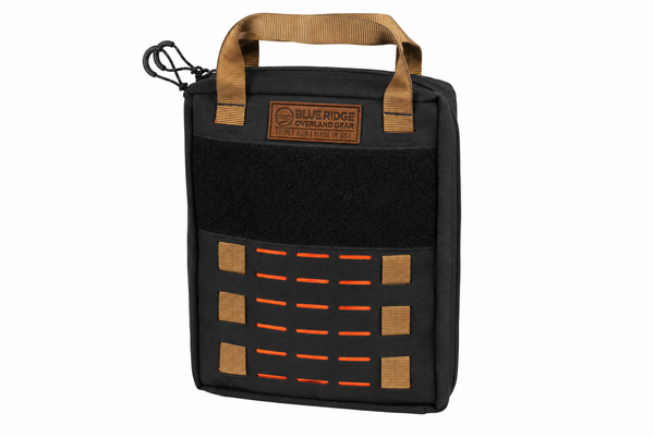 Black BROG Gadget Bag with coyote handles and attachment tabs, leather Blue Ridge Overland Gear patch, black hook-and-loop panel, orange-backed laser-cut MOLLE slots, and zippered closure.