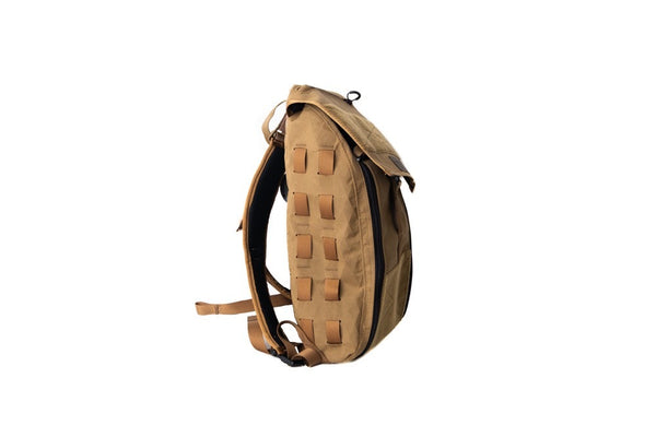 Coyote Brown backpack with a grid pattern on a white background