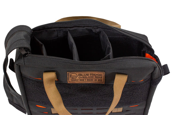 Open Speakeasy Bourbon Bag by Blue Ridge Overland Gear showing adjustable padded interior dividers for organizing and protecting bottles.