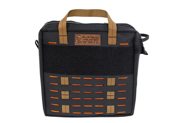 Front view of the Blue Ridge Overland Gear Speakeasy Bourbon Bag with carry handles, large hook-and-loop panel, and MOLLE-style attachment slots.