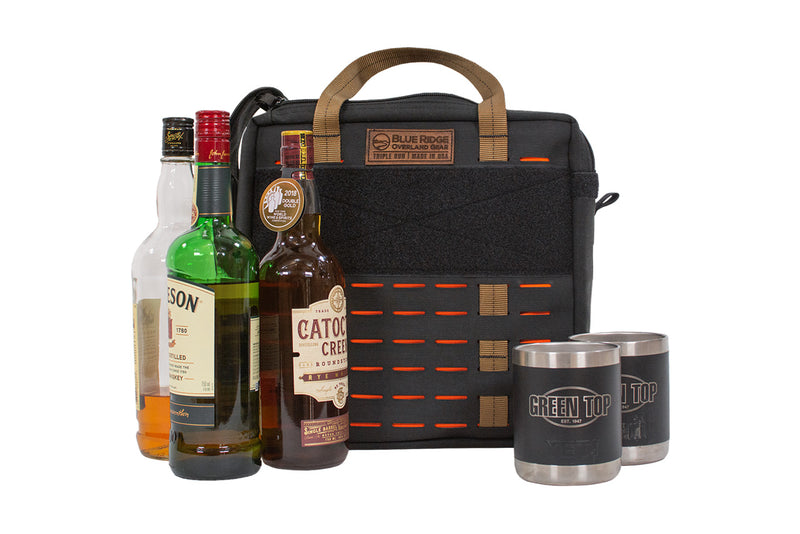 The Speakeasy Bag alongside everything it can hold, including three bottles and two tumblers