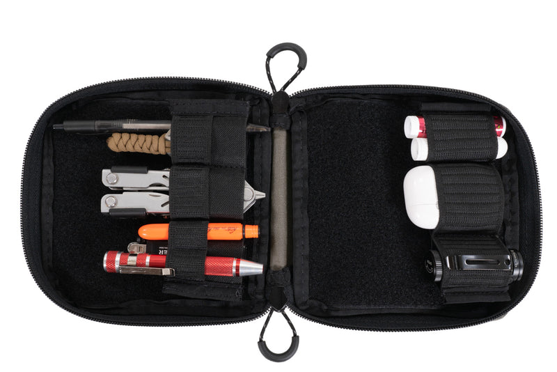 Blue Ridge Overland Gear EDC pouch, open with organizers attached vertically, full of various gear