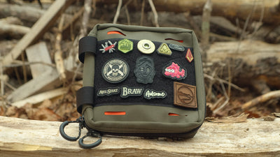 BROG EDC pouch with the front velcro field covered in various patches