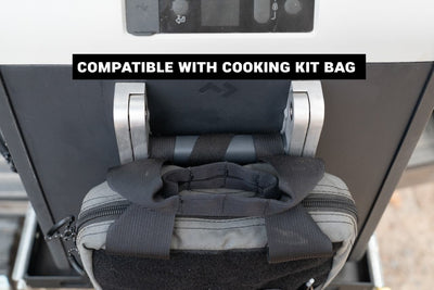 You can use both our Tie-Down Strap Kit and our Cooking Kit Bag on one portable cooler - like this one from Dometic. 