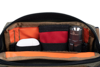 First Aid Wallet - folded in the Velcro Elastic Keeper 6" and attached on the interior of a Bum Bag