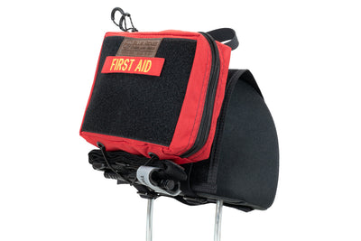 IFAK Velcro Pouch 2.0 - attached to headrest via the Headrest Velcro Panel, with First Aid velcro label