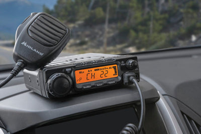 Midland MXT400 40-Watt TWO-WAY GMRS RADIO on dashboard with handset