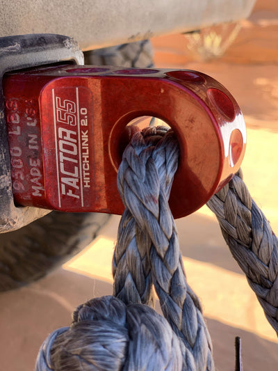 Factor 55 HitchLink 2.5 Receiver Shackle Mount close up of a soft shackle going through the eye hole