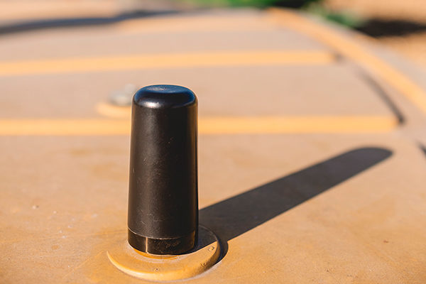 Midland MXTA25 3DB Gain GMRS Low Profile GHOST Antenna installed on a vehicle roof via a drilled hole