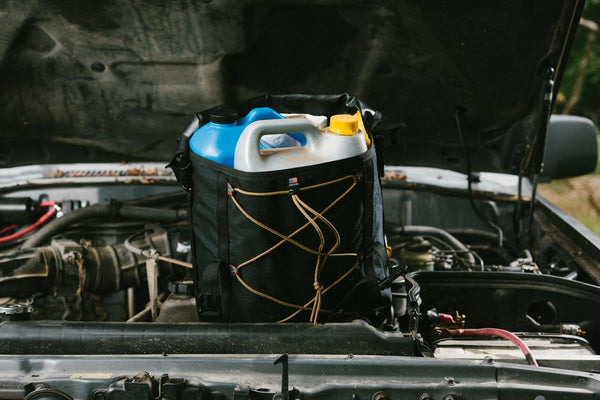 Overland Oil Bag with jugs of vehicle fluids - Blue Ridge Overland Gear