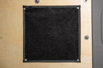 Pouch Mounting Panel 12x12" - Mounted to the inside wall of a vehicle with large headed screws