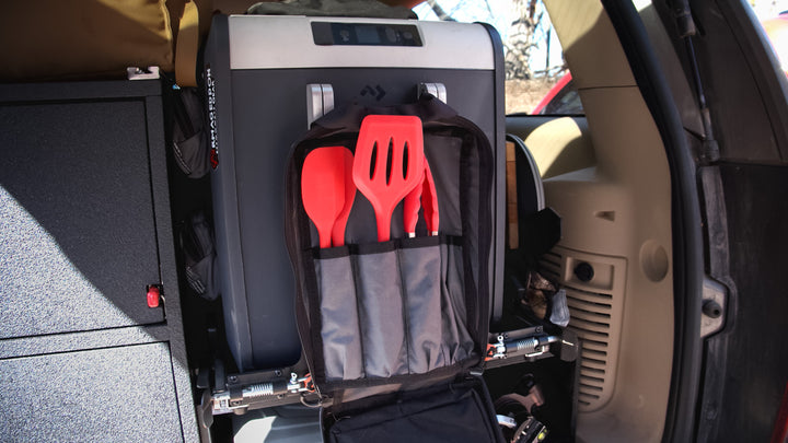 Camp Cooking utensils stored in BROG Cook Kit bag, hung in vehicle