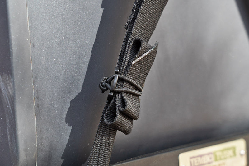 Each Fridge Tie-Down Strap includes a Web Dominator for keeping the tail of the strap neat.