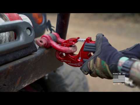 FACTOR 55 UltraHook Low Profile Shackle Mount Video. Image shoes a person clipping the ultra hook to a bow shackle on a bumper
